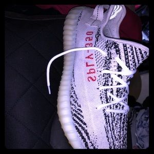 Yeezy 350 v2 zebras, bottoms are worn.